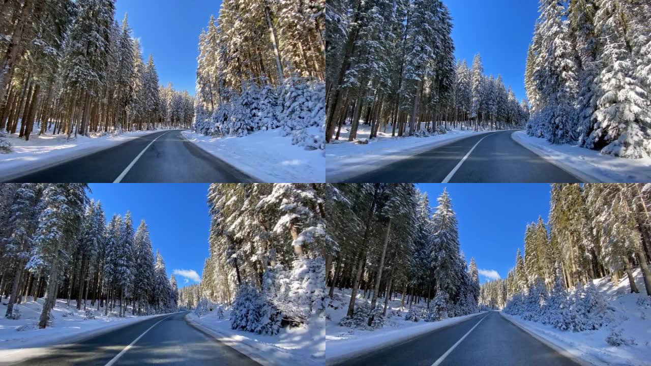 车辆驶过雄伟的冬季景观