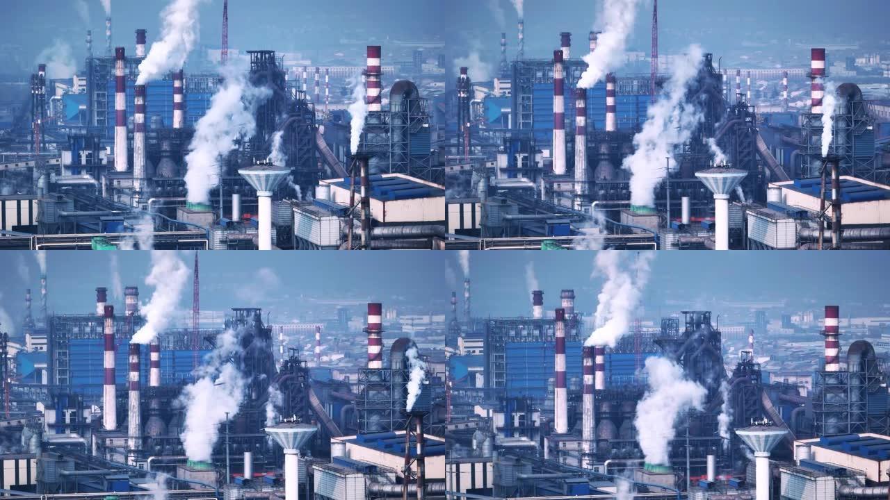 工厂里的烟熏烟囱烟囱污染废气排放高压电塔