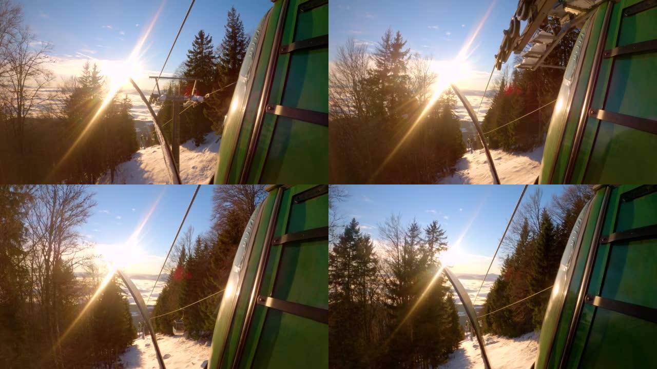 特写: 滑雪板后从滑雪场带缆车的美丽下降