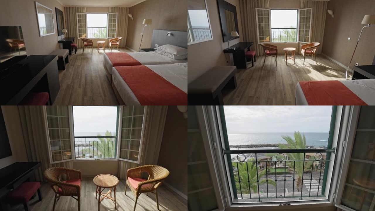 经典酒店房间的床、桌子和两把椅子。舒适的放松场所。摄像机在度假酒店的空房间上移动。万向节射击