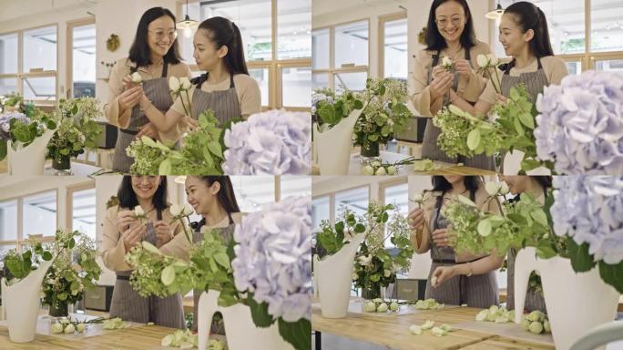 年轻的亚洲花店学习如何在车间布置花瓣的视频