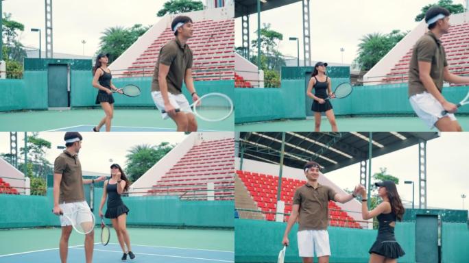 一群健康的年轻人一起享受网球比赛。