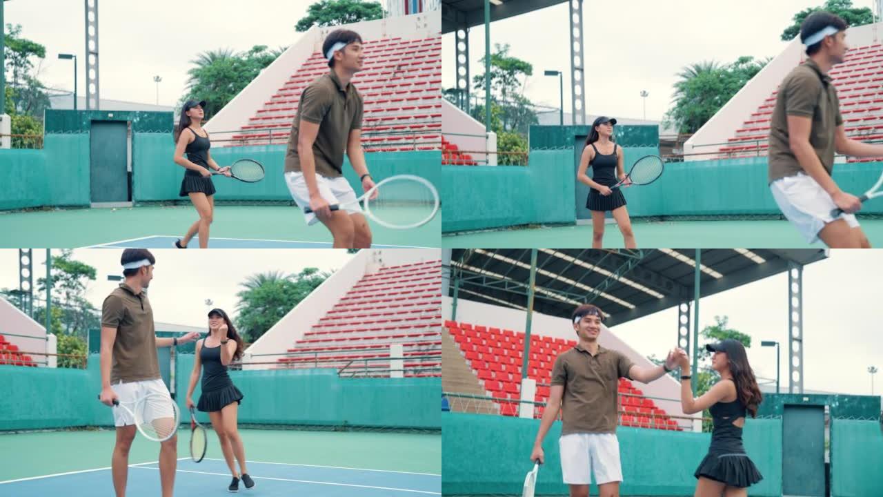 一群健康的年轻人一起享受网球比赛。
