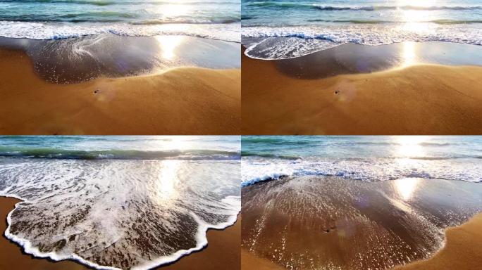 美丽的海浪和水中的太阳反射