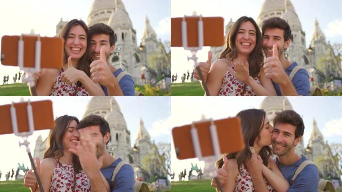 法国巴黎一对年轻夫妇在圣心教堂前自拍的4k视频片段