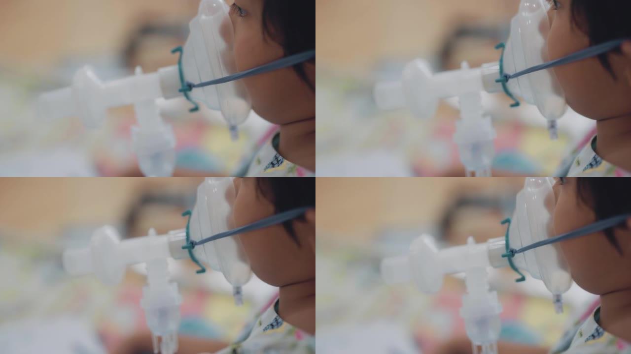 患有哮喘过敏的男孩患者使用哮喘吸入器。用于医院治疗的吸入器面罩。