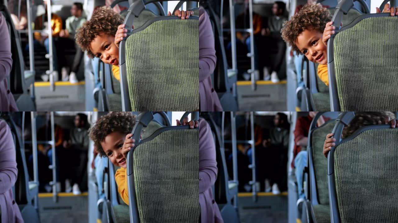 非裔美国小男孩在公共巴士内玩peek-a-boo