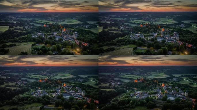 田园诗般的乡村景观，与德国中世纪小镇布兰肯伯格 (Blankenberg) 在黄昏时-空中拍摄