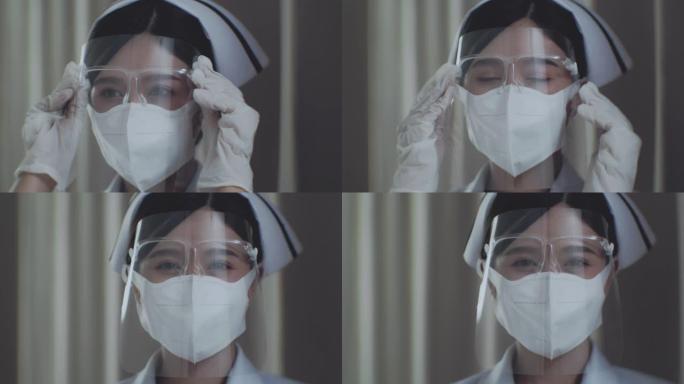 女护士应用面罩特写镜头戴护目镜面对镜头微