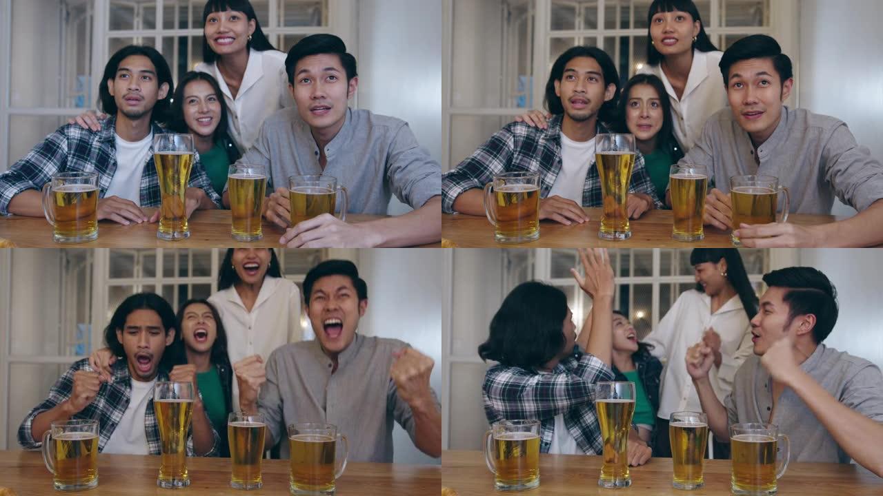 一群年轻的亚洲游客朋友在体育电视上看足球，喝酒精啤酒，并在考山路的夜总会举行聚会。