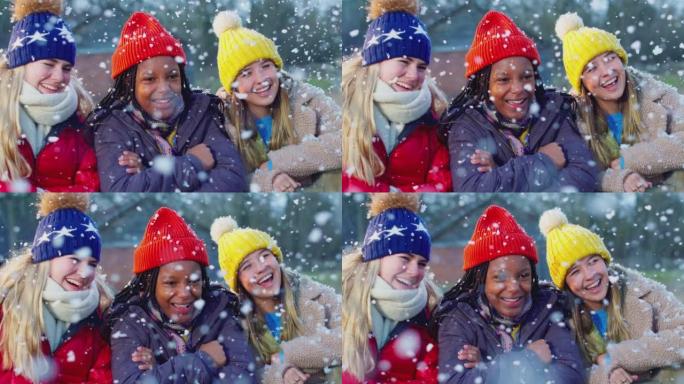 十几岁的女孩在乡下一起享受下雪的冬天散步的肖像 -- 慢动作拍摄