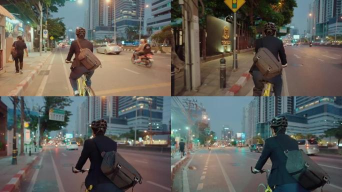 商人下班后骑着自行车穿过城市。