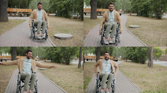 在城市公园坐轮椅的快乐截瘫男子的肖像微笑着独自玩耍