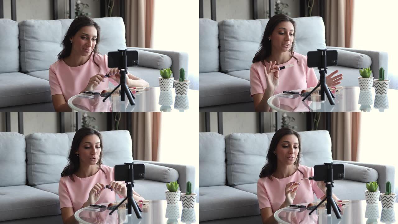 化妆师女孩在智能手机vlog上录制谈论遮瑕膏