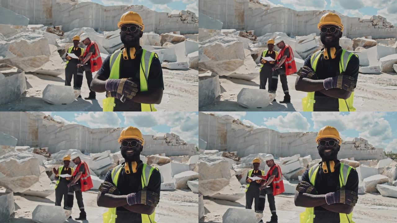 自信的黑人工头在采石场工作