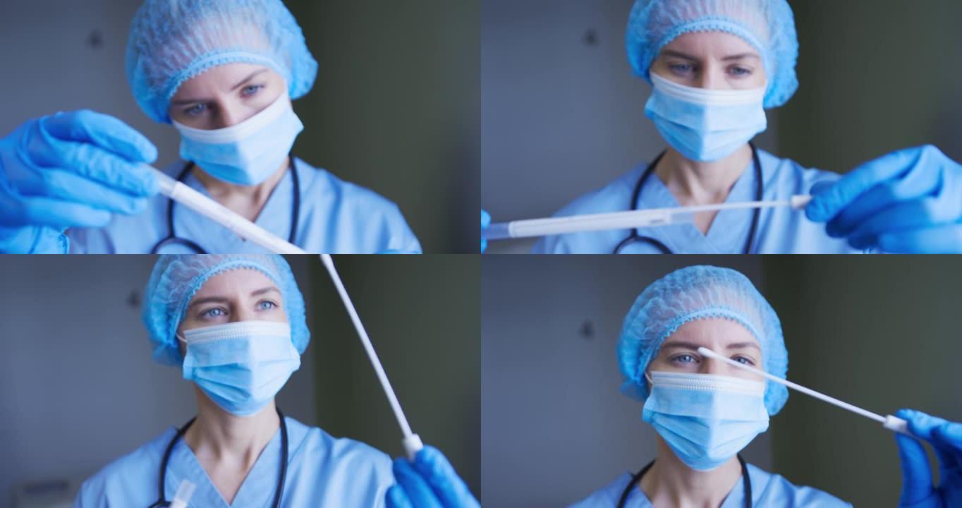 女性白人医生穿着防护服为患者修复covid拭子测试