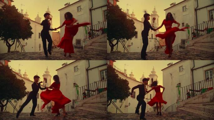 美丽的夫妇在城市老城区的安静街道上跳拉丁舞。在古老的文化底蕴丰富的旅游地点，由两名专业舞者在日落时进