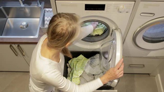 卸载洗涤物洗衣机晾衣服