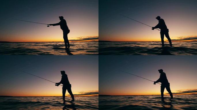 一名男子在日落时将钓鱼竿扔进水中