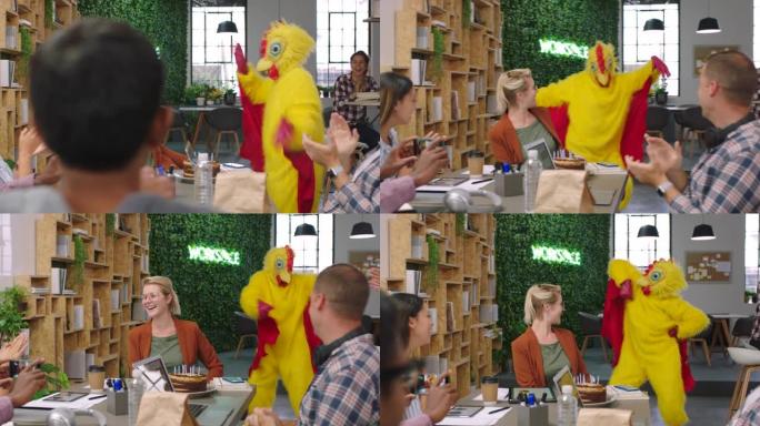 跳舞，掌声和办公室里有鸡肉吉祥物的商人玩得开心。商务会议，鼓掌或一群快乐的员工享受与喜剧员工一起跳舞