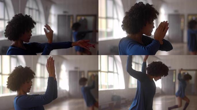 非裔美国妇女在工作室做瑜伽程序