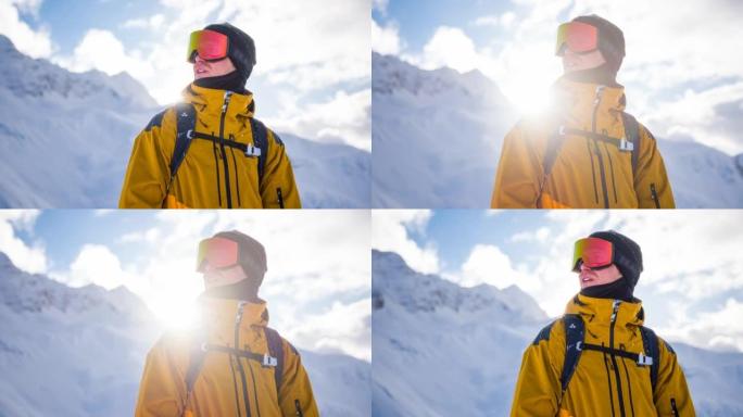滑雪者被雪山环绕，在美丽的阳光明媚的冬日享受冬季风景