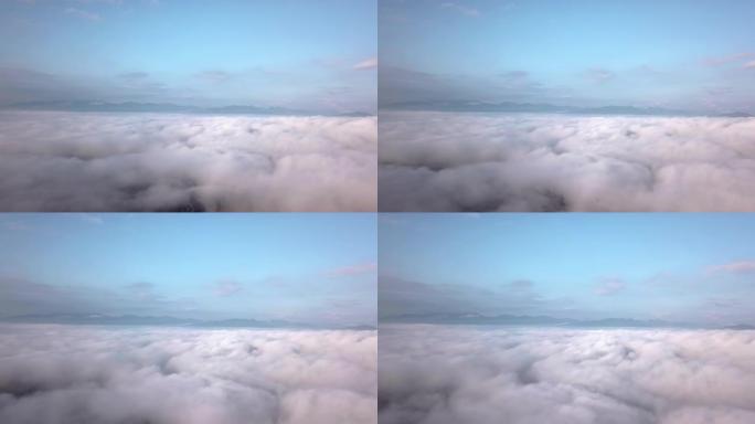 云层上方湖泊上空的空中拍摄