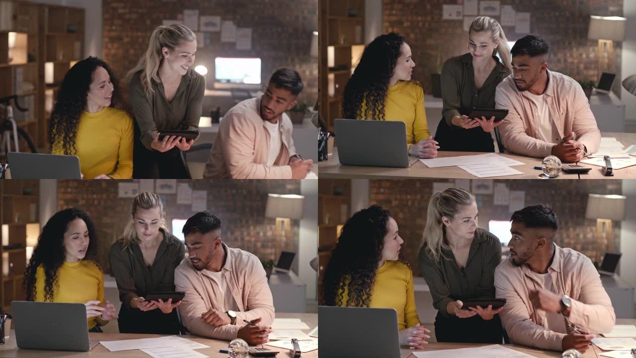 平板电脑、笔记本电脑和团队在一个创造性的协同办公空间办公室一起工作。在广告公司讨论创意报告时，团队合