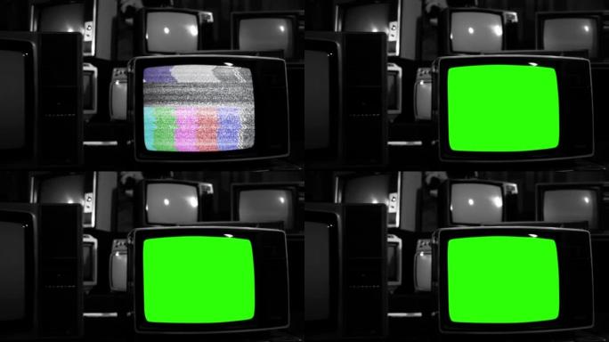 在许多老式电视中，旧电视打开色度键绿色屏幕。黑白色调。特写。