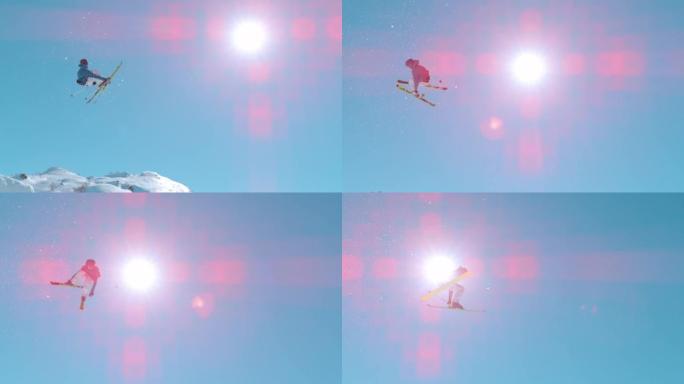 慢动作: 年轻的滑雪者在白雪皑皑的滑雪区的雪公园跳大型飞球