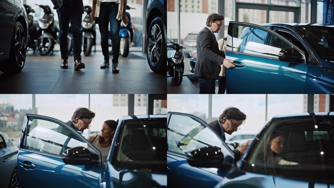 SLO MO成熟男汽车推销员向成熟女人展示新车的内饰