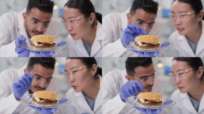 微生物学家用体外肉分析实验室汉堡