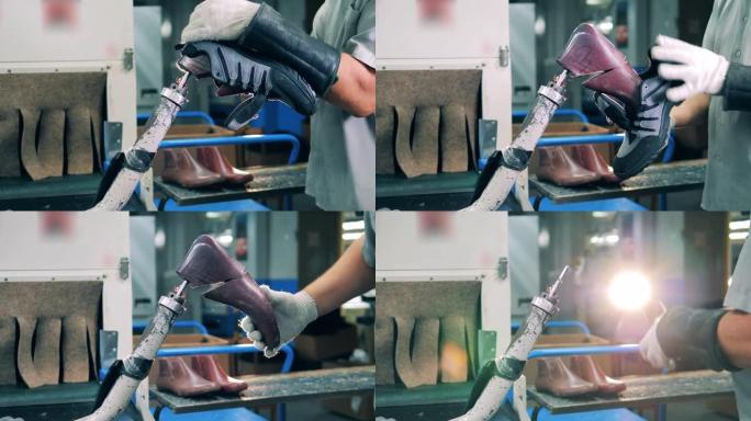 制鞋厂的工人从鞋子里掏出一个插片。制鞋业概念。