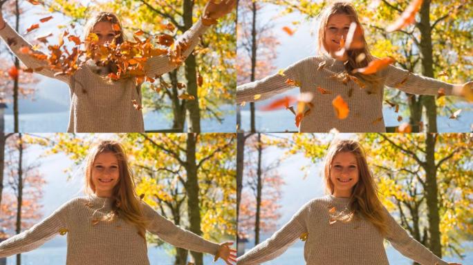 年轻女子在大自然中享受美丽阳光明媚的秋日