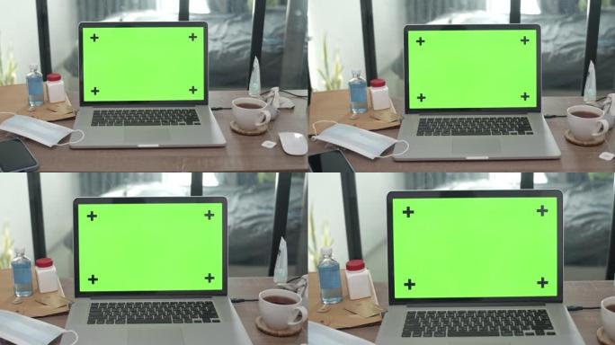 绿屏电脑笔记本电脑的多莉镜头，没有人