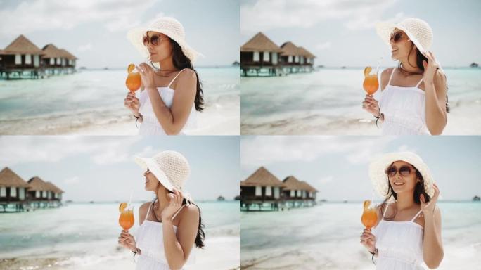亚洲旅游妇女喝橙汁，健康饮料