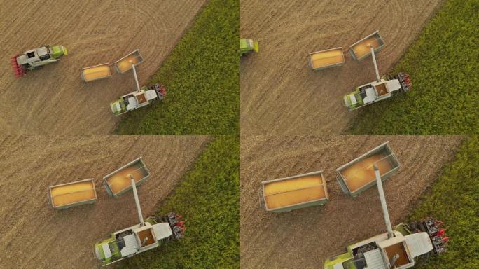 空中联合收割机将玉米卸载到拖车中