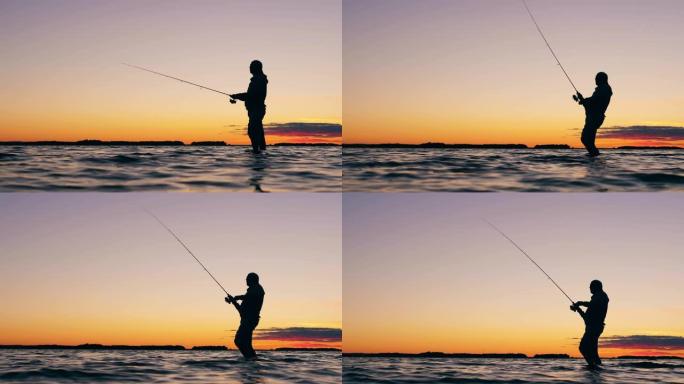 一个人正在用钓鱼竿从湖里捞一条鱼
