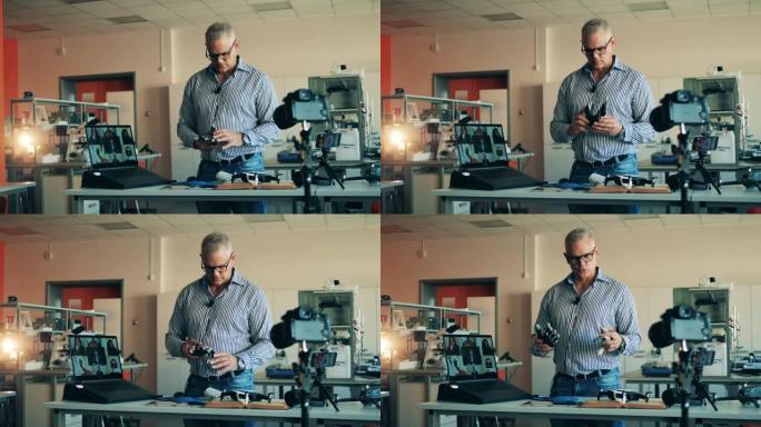 在线课堂，远程学习概念。一个男人正在向他的在线学生谈论仿生零件