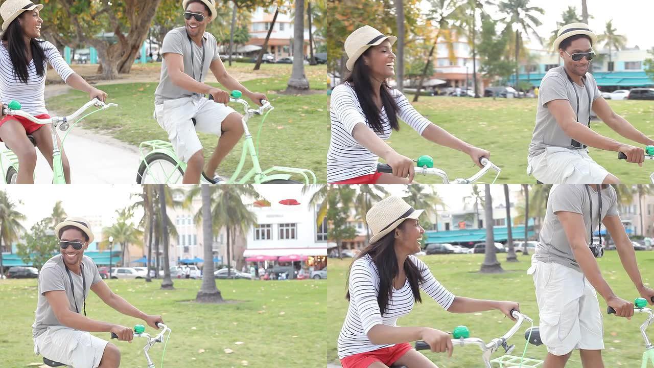 年轻夫妇骑自行车玩得开心