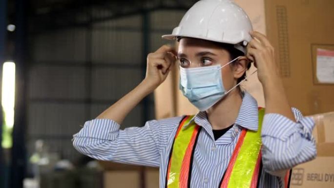 劳工女工戴防护面罩脸部及安全帽