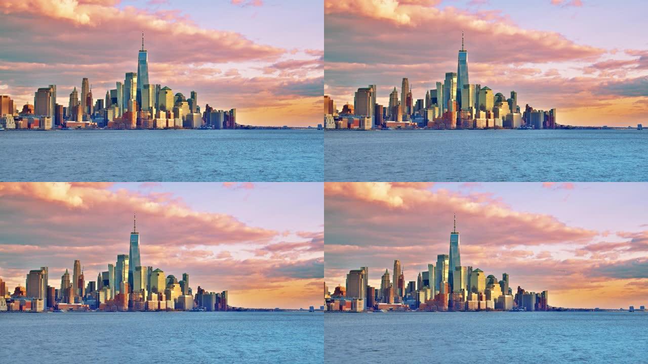 远处的曼哈顿岛。水锋。日落。著名的城市天际线。