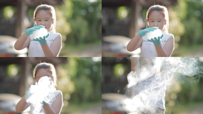快乐的小女孩玩肥皂泡