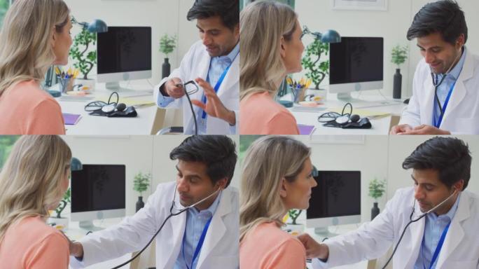男医生或全科医生穿着白大褂检查成熟的女人用听诊器听心跳-慢动作拍摄