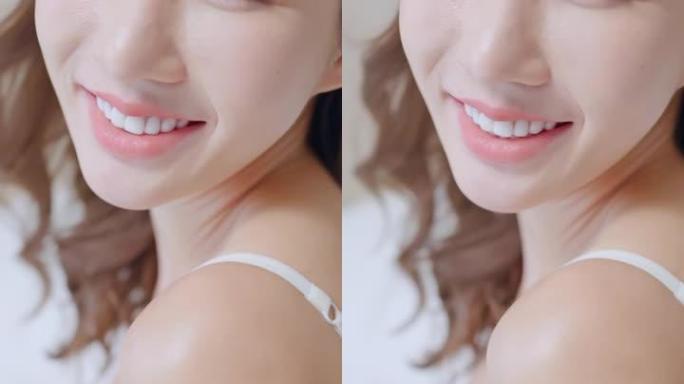 漂亮的亚洲女性白牙