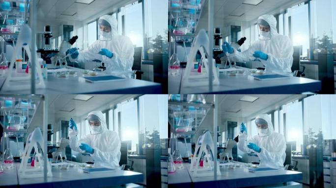 美丽的女医学家穿着工作服和面罩，使用微量移液器，同时使用培养皿。具有现代化设备的疫苗、药物研发实验室