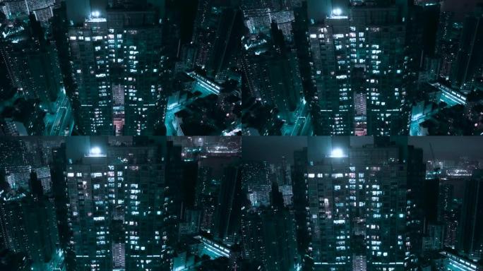 无人机拍摄的香港夜晚现代玻璃摩天大楼的镜头