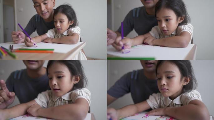 亚洲父亲在家在线学习时帮助女儿
