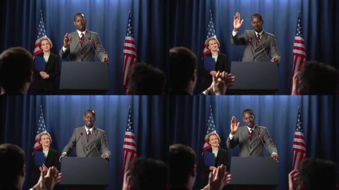 一位非洲裔美国候选人的辩论演讲结束后，观众向他鼓掌
