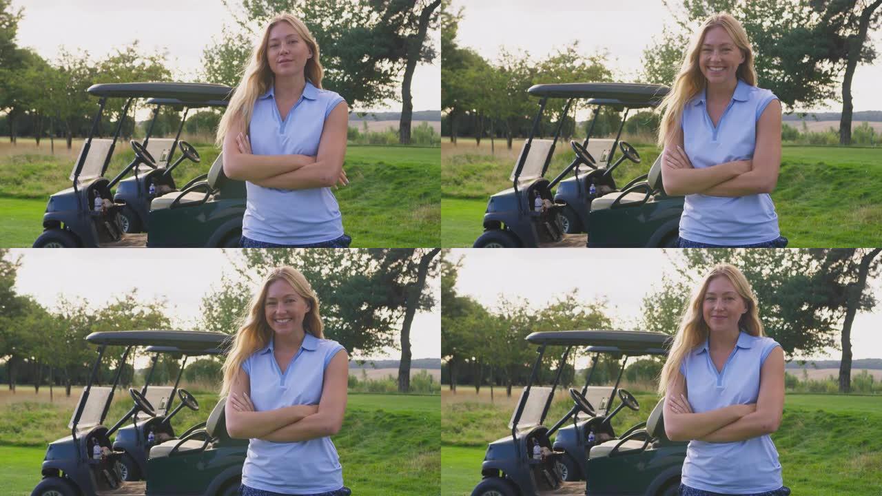 站在高尔夫球场上的女高尔夫球手的肖像